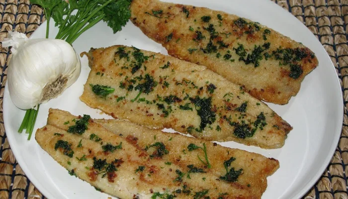 Receta de trucha al ajillo con hierbas andinas