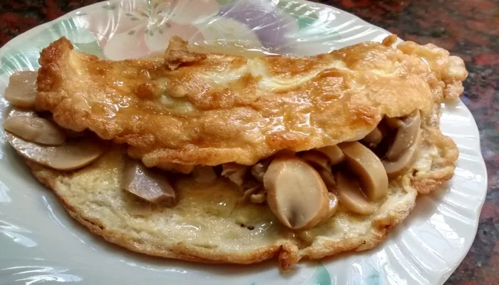Receta de omelette de champiñones